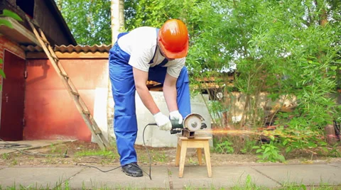 Worker cutting metal Stock Footage 35571621