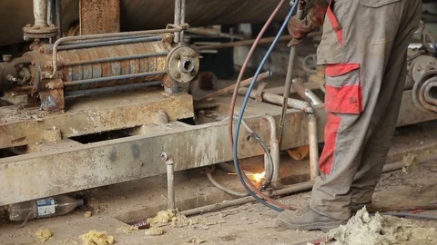 Worker Cutting Metal with a gas Flame torch in Metal industry for recycling  Video stock 87464085