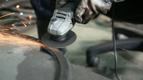 Worker cutting metal with grinder 库存影片 47857900