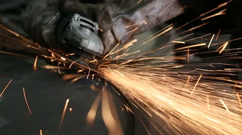 Worker cutting metal with grinder Stock Footage 47858010