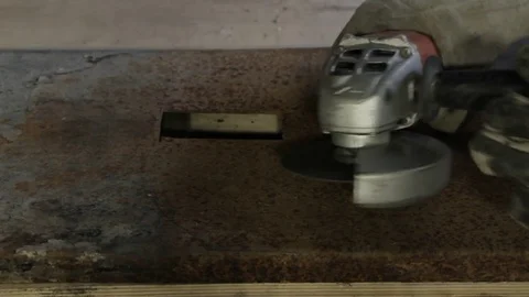 Worker cutting metal with grinder Stock Footage 73167585