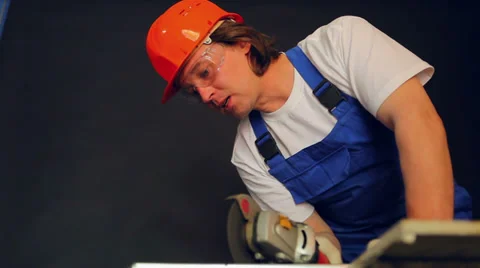 Worker cutting metal, huge amount of sparks Stock Footage 35572013