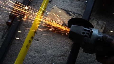 Worker cutting a metal pipe. slow motion shot Stock Footage 70999619