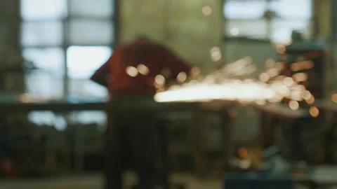 Worker cutting metal with a power tool Stock Footage 89552583