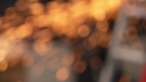Worker cutting metal tube using an Angle Grinder. Bright sparks and flashes Stock Footage 263186561