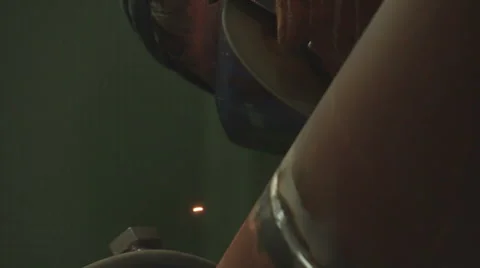 Worker cutting metal using angular grinding machine Stock Footage 60125744