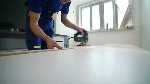 Worker cutting the peace of wood.  Medium shot Stock Footage 48631753