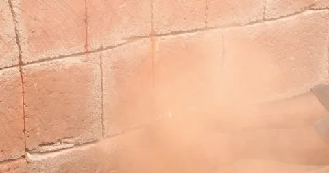 Worker cutting a precise in a stone wall Stock Footage 324274412