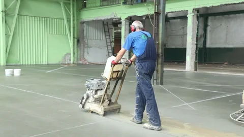 Worker is cutting solid concrete with a machine 스톡 동영상 152871678
