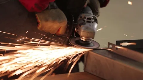 Worker Cutting Steel With Angle Grinder Stock Footage 71408564