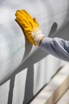 Worker cutting stone with grinder Stock Photos