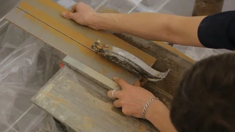 Worker cutting tiles on tile cutter Stock Footage 128417285