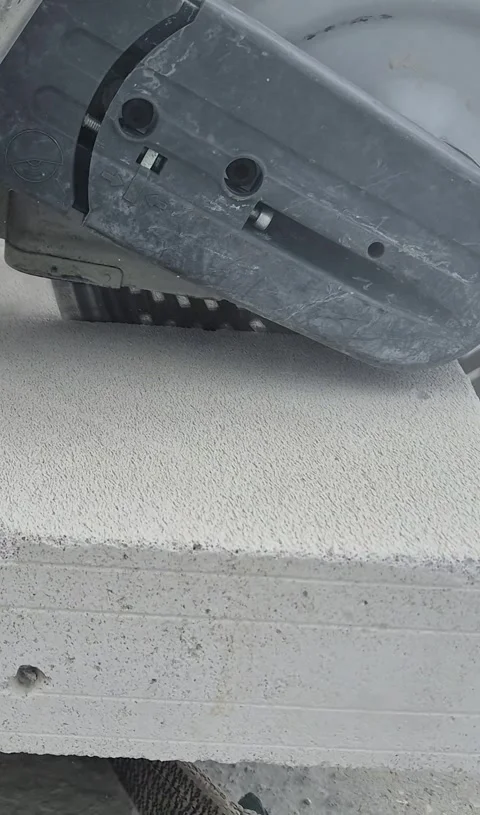 Worker Cutting Wall with Circular Saw, Vertical 9:16 Stock Footage 337055892