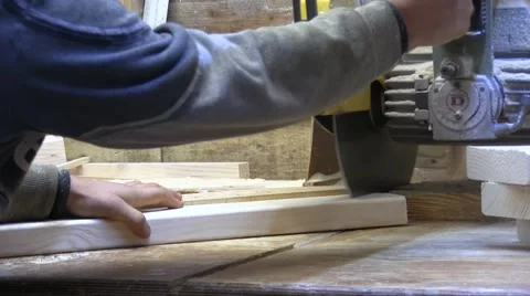 Worker Cutting Wood Board With Circular Saw Stock Footage 56262238