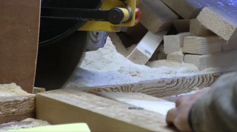 Worker Cutting Wood Board With Circular Saw Stock Footage 56262428