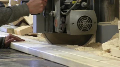 Worker Cutting Wood Board With Circular Saw Stock Footage 56263107