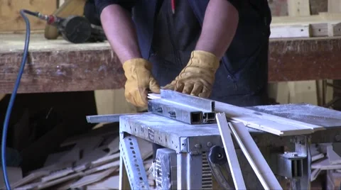 Worker Cutting Wood Board With Circular Saw Stock Footage 56263194