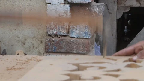 A Worker Cutting Wood Design using electric cutter machine Stock Footage 86653997