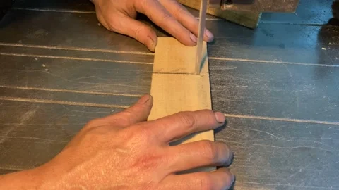 Worker cutting wood on saw machine Stock Footage 228646894