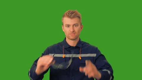 Worker demonstrates the need for protective eyewear and earplugs Stock Footage 108480466