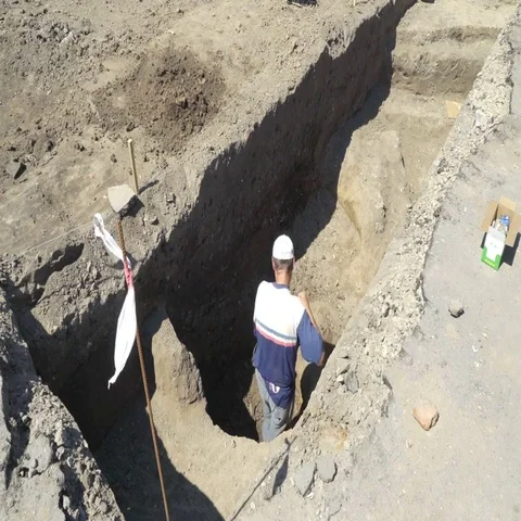 Worker digs a pit. Archaeologist explore excavation Stock Footage 69427882