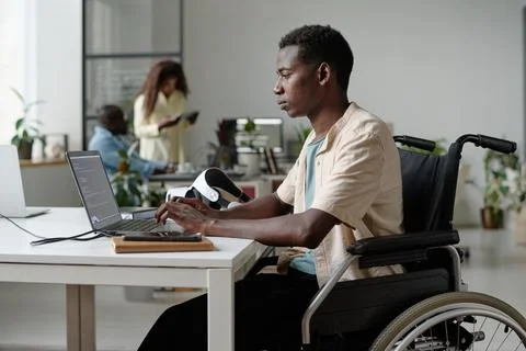 Worker with Disability Coding Stock Photos