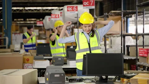 Worker in distribution center in packing point it's time to finish work Stock Footage 233009536
