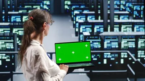 Worker doing regular server upgrades Stock Photos