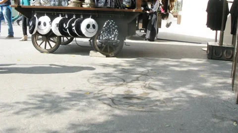 Worker draws a brush on asphalt portrait of Mickey Mouse. Stock Footage 47469432