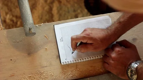 Worker draws a diagram Stock Footage 66720061