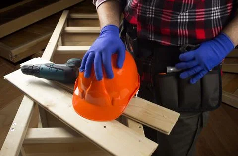 Worker with drill &amp; helmet. Stock Photos