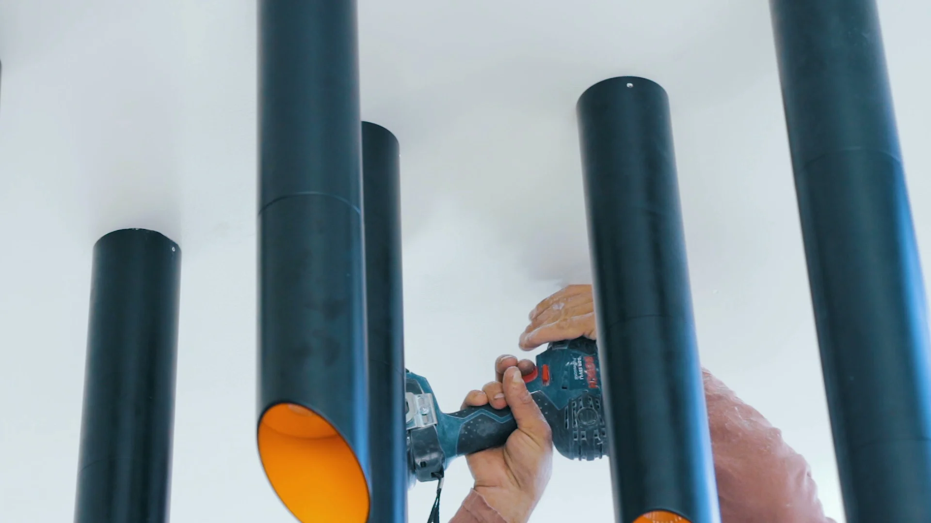 Worker Drill Hole In Drywall Ceiling For Mounting Lamp Worker Drill Hole In Drywall Ceiling For Mounting Lamp Video 84592190