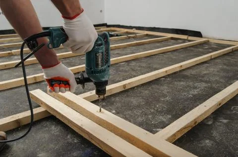 Worker drill holes. Stock Photos