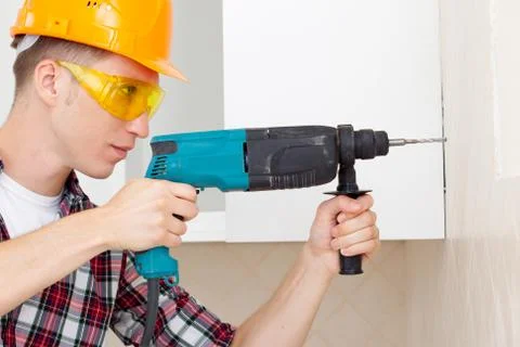 Worker with drill Stock Photos