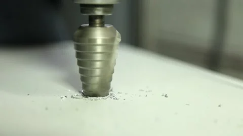 Worker drilling aluminum with step drill Stock Footage 62355499