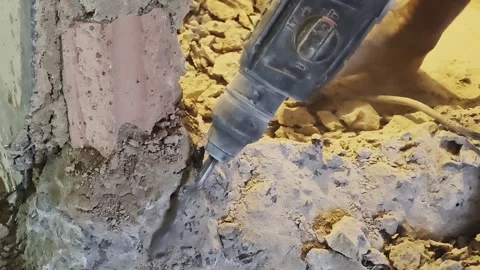 Worker Drilling Concrete and Brick Wall with Rotary Hammer Drill Close Up Stock Footage 342687025