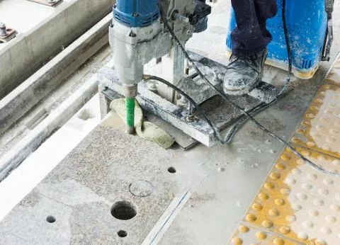 Worker drilling floor Stock Photos