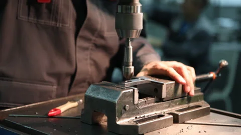 Worker at drilling machine 스톡 동영상 99179186
