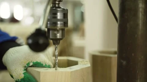 Worker drills hole Stock Footage 147497522