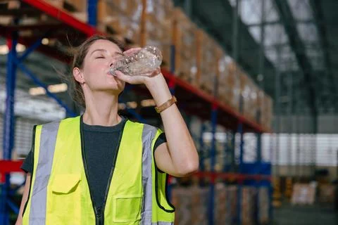 Worker drinking water refresh dehydrate drink cool water chill relax brake .. Stock Photos