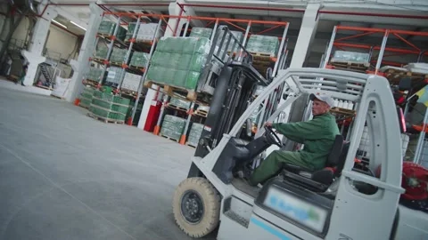Worker Driver Moving Forklift Pallet At Warehouse Stock Footage 197115809