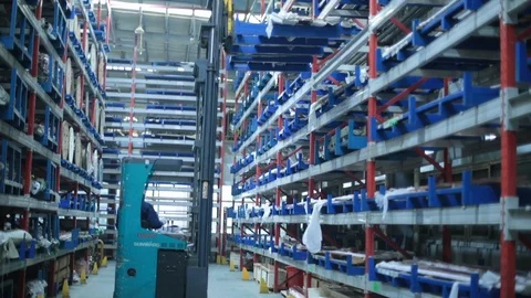 Worker driving forklift in warehouse,HD Stock Footage 117898991