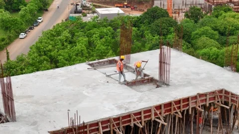 Worker engaged in construction activities at an active construction site Stock-Footage 344021468