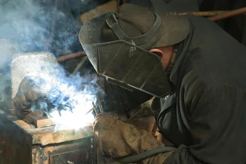 Worker is engaged in welding Stock Photos