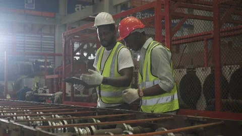 Worker, Engineer Team working together and foreman in a heavy factory. Stock Footage 172574882