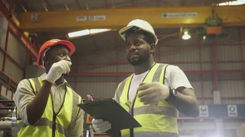 Worker, Engineer Team working together and foreman in heavy factory. Stock Footage 172581714