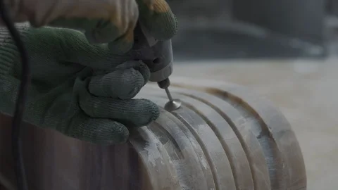 Worker engraving marble with electrical engraver, visible stone dust, closeup 스톡 동영상 99039108