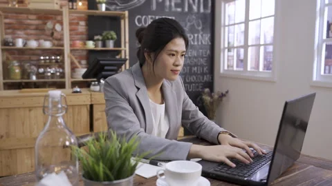 Worker enjoy mug of beverage while working Stock Footage 133400035