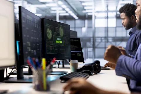 Worker ensures data center operates efficiently, eliminating all errors Stock-Fotos