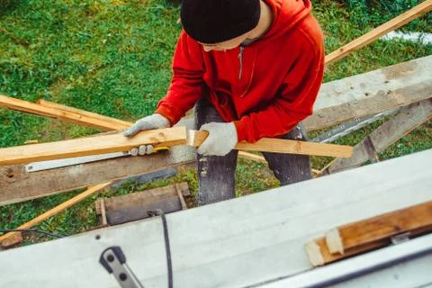 A worker on the facade of the building Stock Photos